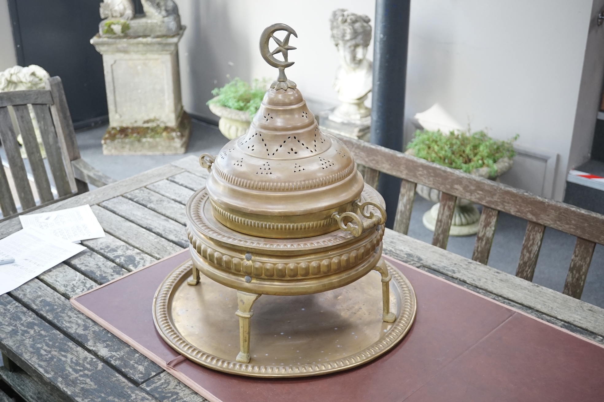 A Middle Eastern brass 'Mangal' brazier, with pierced decoration, 60cm high. Condition - good